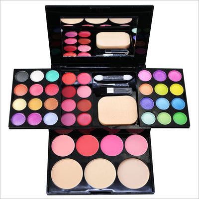Open ADS makeup kit with mirror, color pans, sponge applicators and face brush