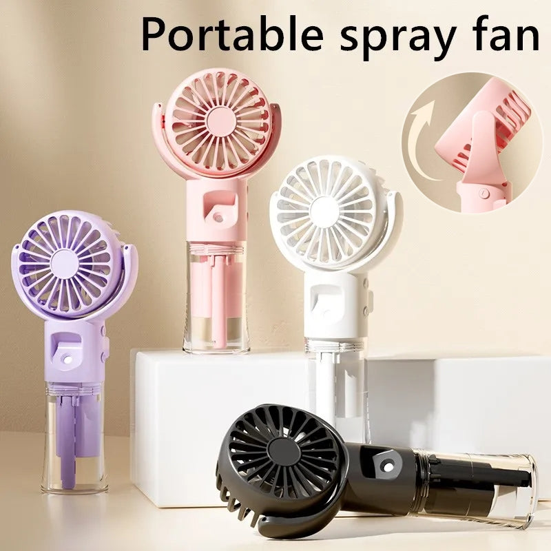 Portable handheld USB rechargeable mist fan with transparent water tank, 4 speed settings, and water spray cooling — YLR Essentials