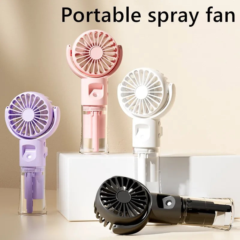 Portable handheld USB rechargeable mist fan with transparent water tank, 4 speed settings, and water spray cooling — YLR Essentials