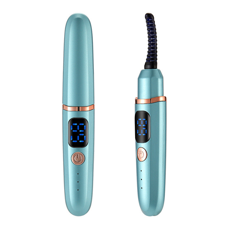Compact heated eyelash curler with curved styling head