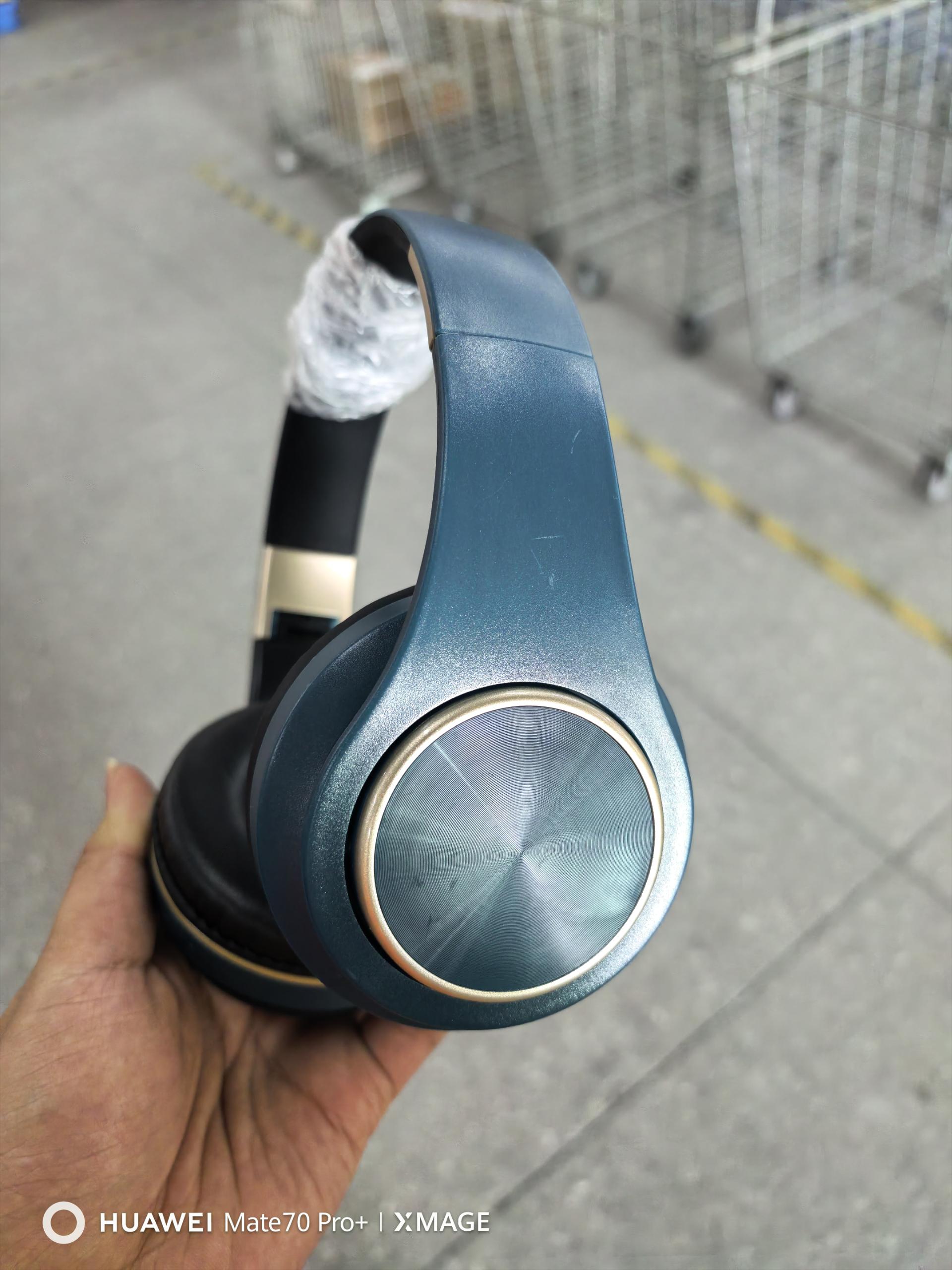Wireless Bluetooth over-ear headphones with cushioned ear pads, built-in controls, and TF card support — YLR Essentials