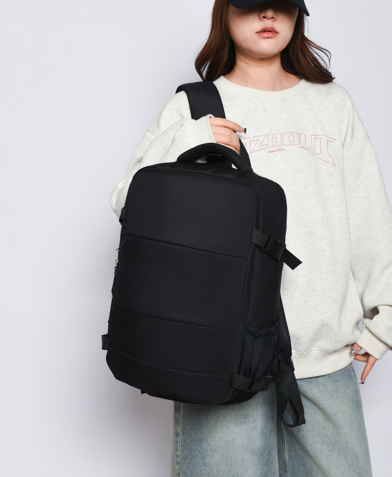 "Large capacity travel backpack with laptop compartment, adjustable shoulder straps, and multi-pocket organization for travel, work, and school"