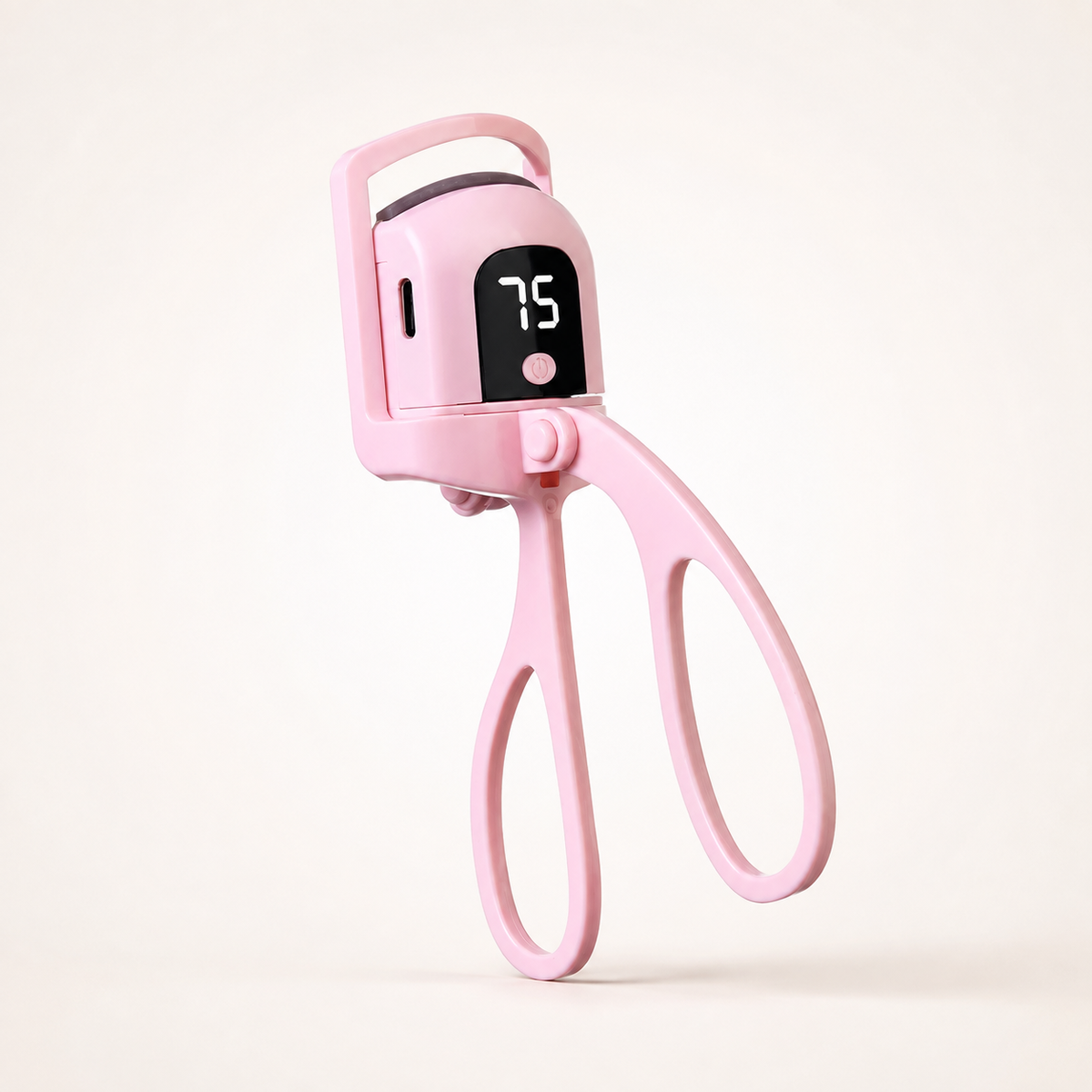 Pink rechargeable heated eyelash curler with LCD display