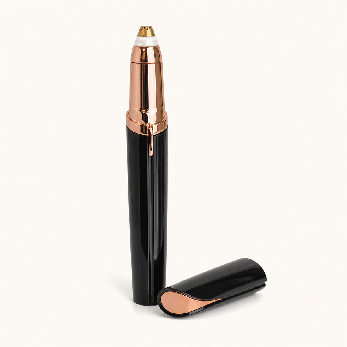 Black battery-powered eyebrow trimmer open with cap removed